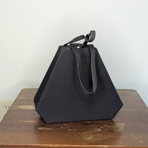 KF Ltd black uniquely shaped evening clutch trapezoid snap closure